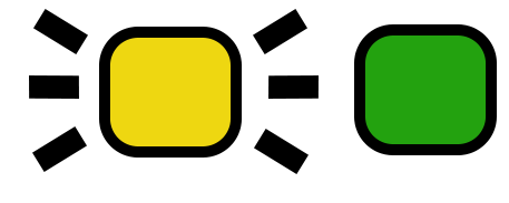 Vilkkuva keltainen ja kiinteä vihreä